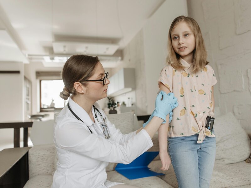 Professional pediatric personal care - nurse with child patient - American Allied Health Columbia SC